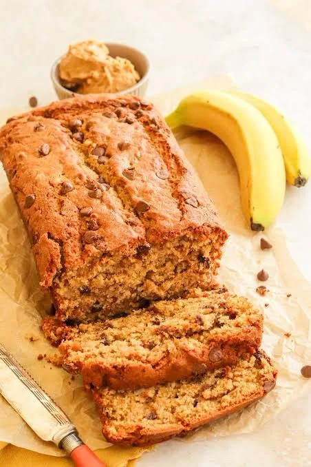 Homestyle banana bread loaf with fresh bananas